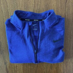 Mens large Nike long sleeved pull over. Great condition. Hardly worn.